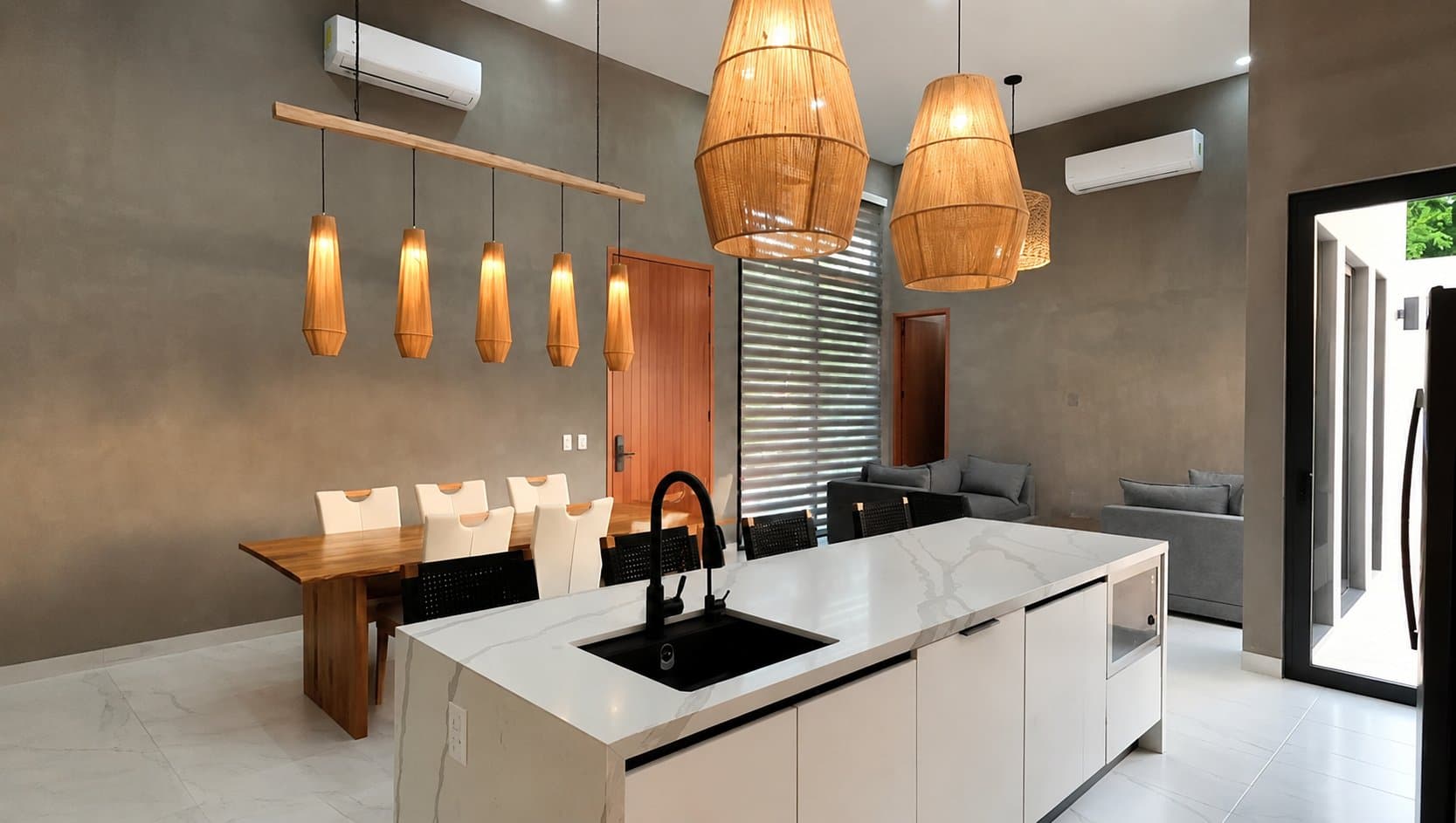 Dining room with a live-edge wood table under a row of woven pendant lights